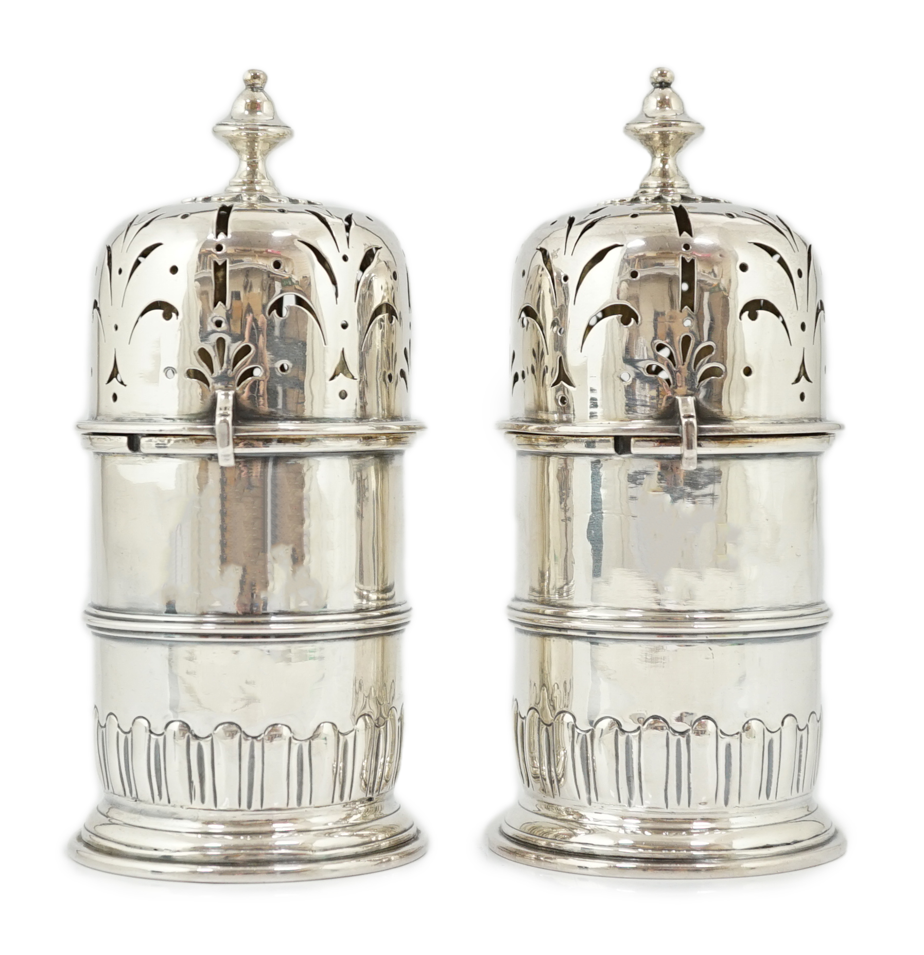 A good pair of late George I silver lighthouse casters, by William Spackman
